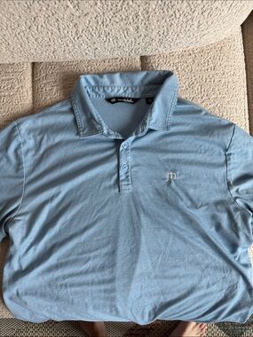 Travis Mathew Light Blue Polo with Subtle Chest Logo